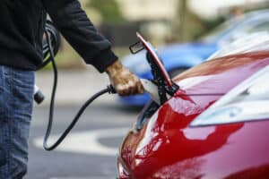 Electric car plugged into charger
